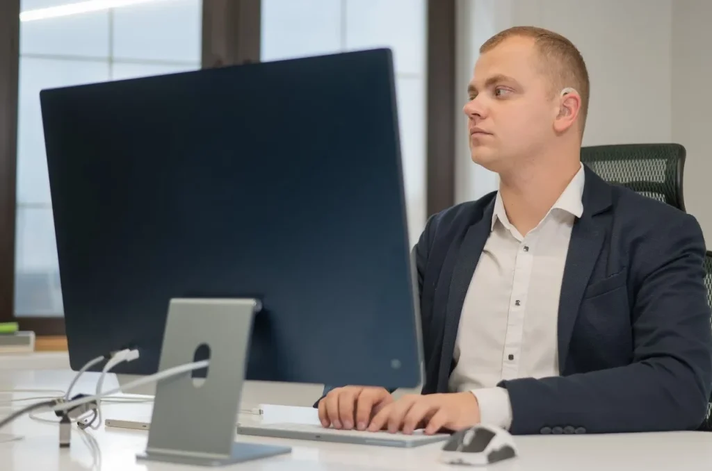 Deaf man using computer